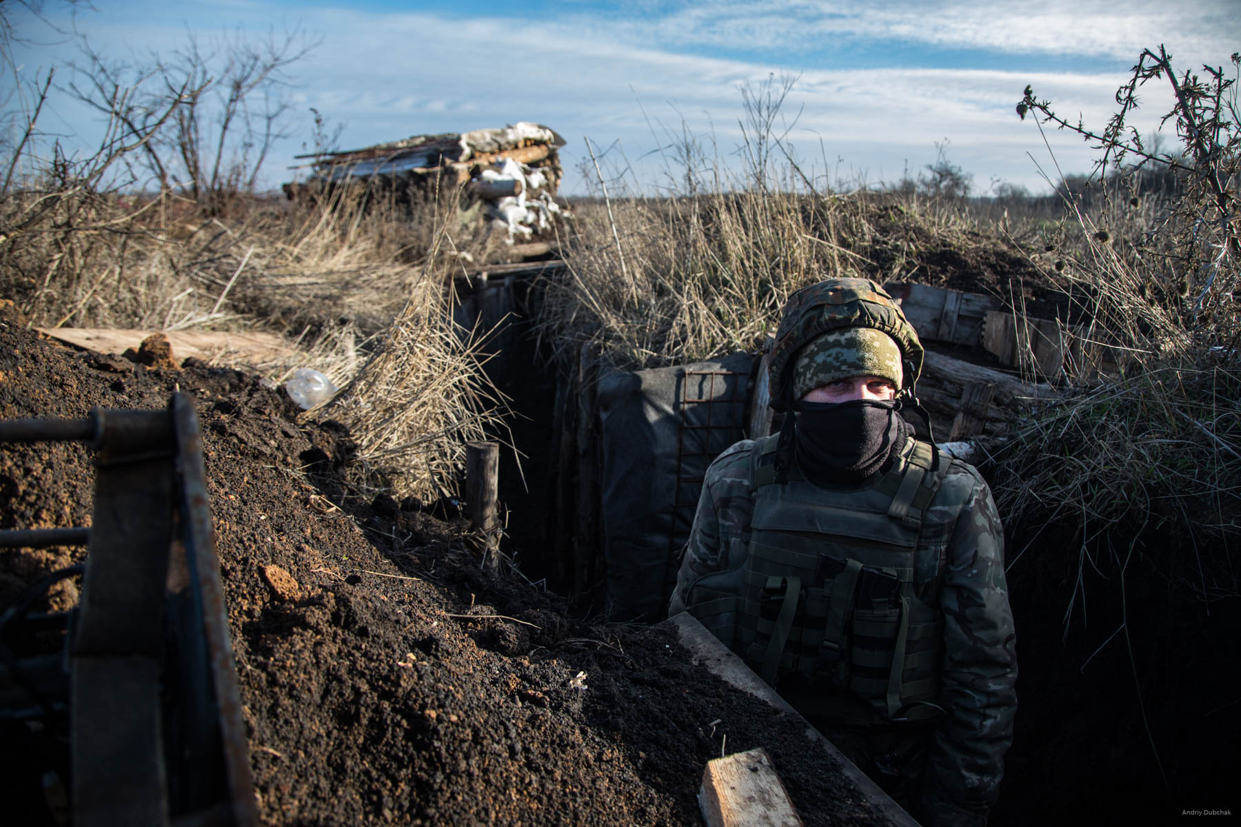 A fighter in the line of trenches at the front, near Popanskaya, December 2017.