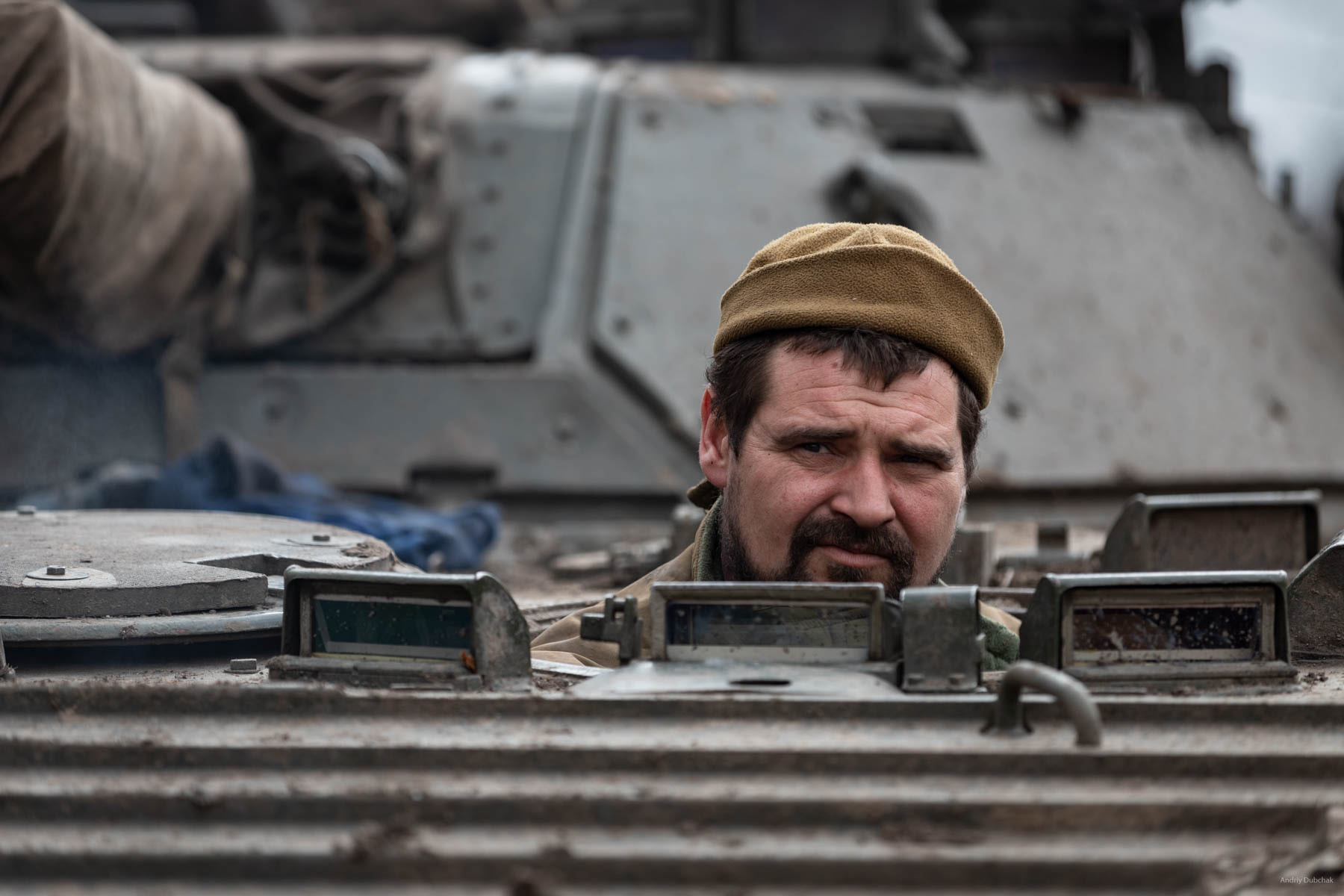A company’s technician with a call name "YU" on BMP-2 during delivery of "BC"(ammunition load) and food to the front. Vodyane, March 2018.