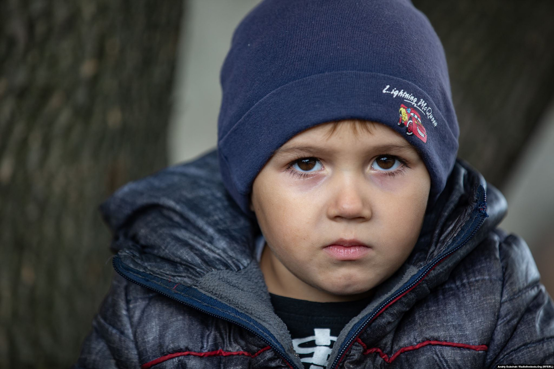 Four-year-old Zhora lives in Zolote. The village is located near the front line in eastern Ukraine and could soon be inside a newly negotiated demilitarized zone. (photo: ANdriy Dubchak)